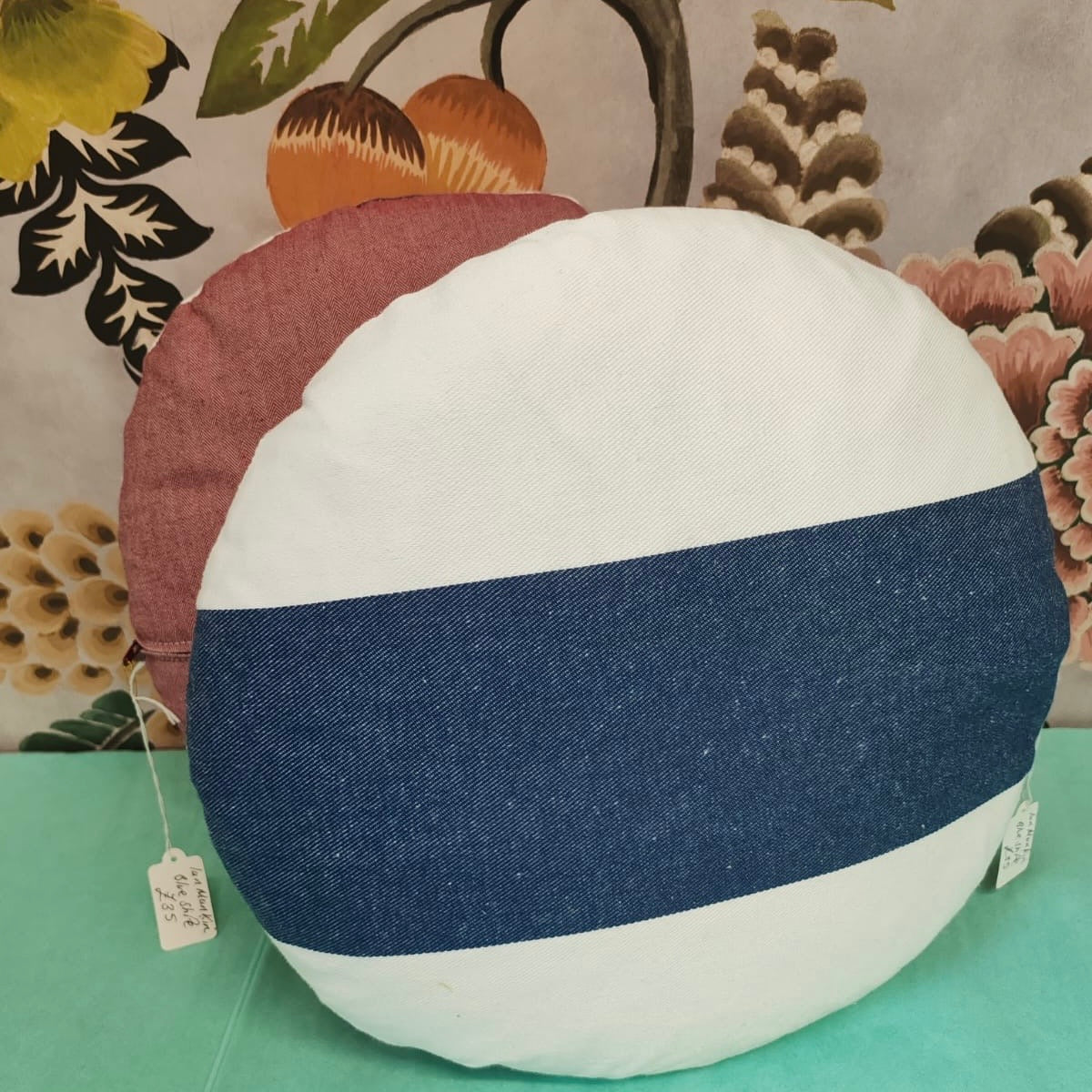Ian Mankin round blue stripe cushion