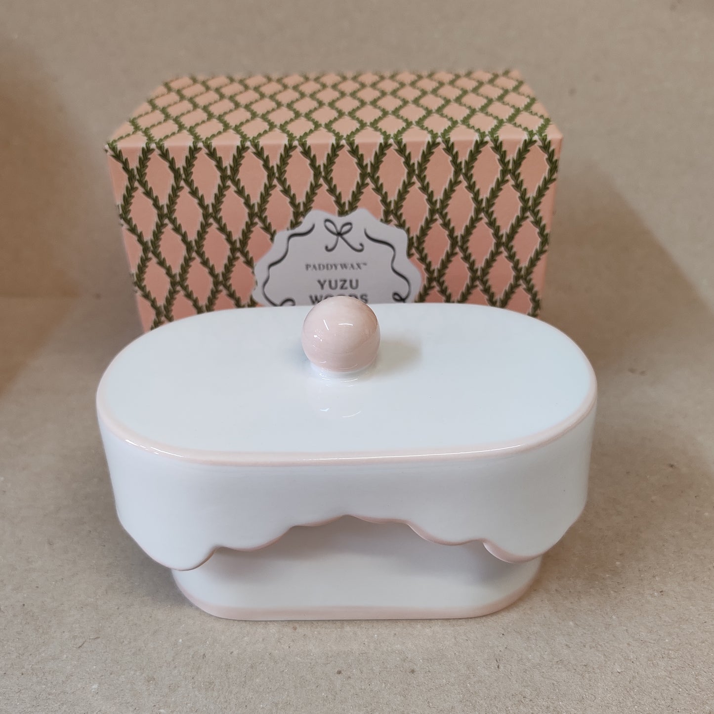 Scented candle in porcelain dish. Yuzu woods scent