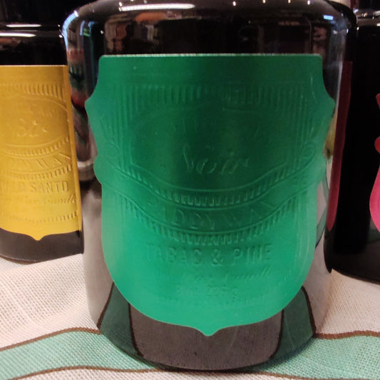 Black Apothecary Jar green foil label. Scent of Tabac and Pine