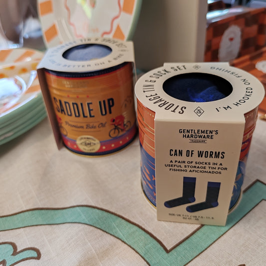 Socks in a tin container bike theme.