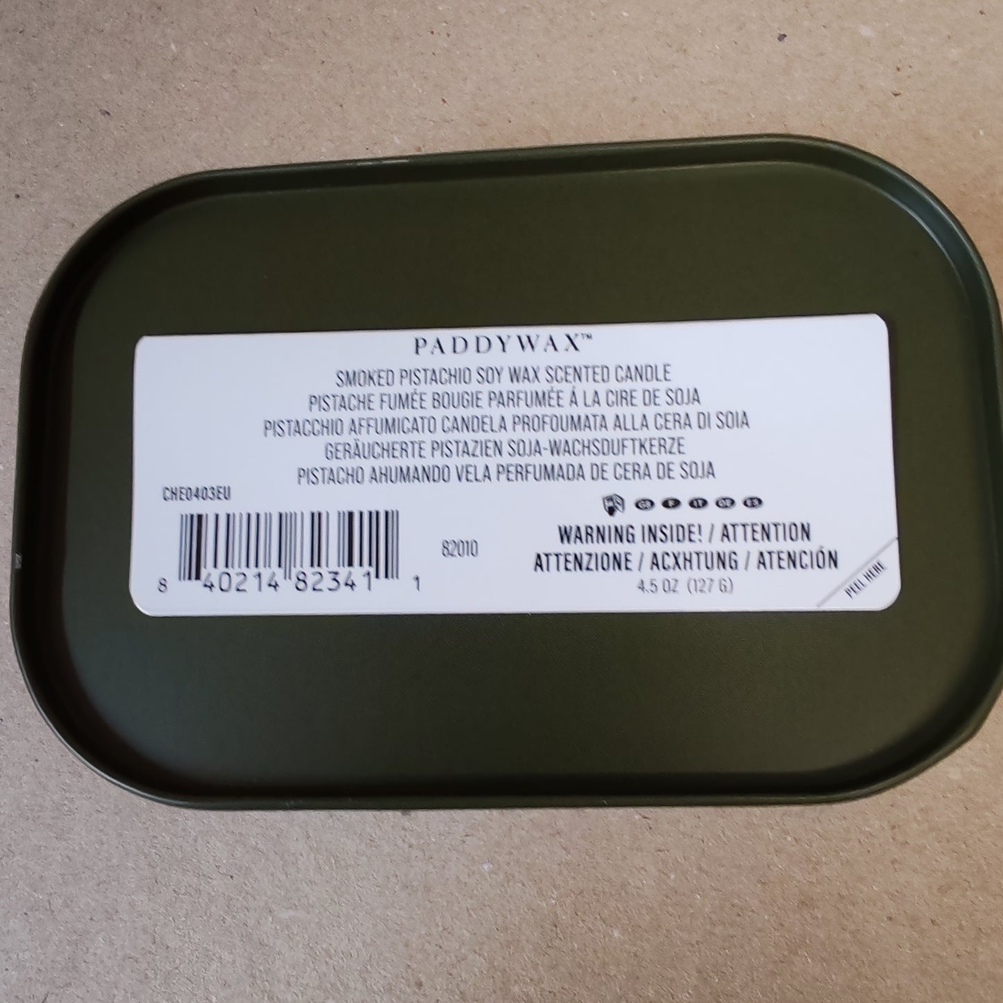 Candle in printed Tin. Scent of Smoked Pistachio
