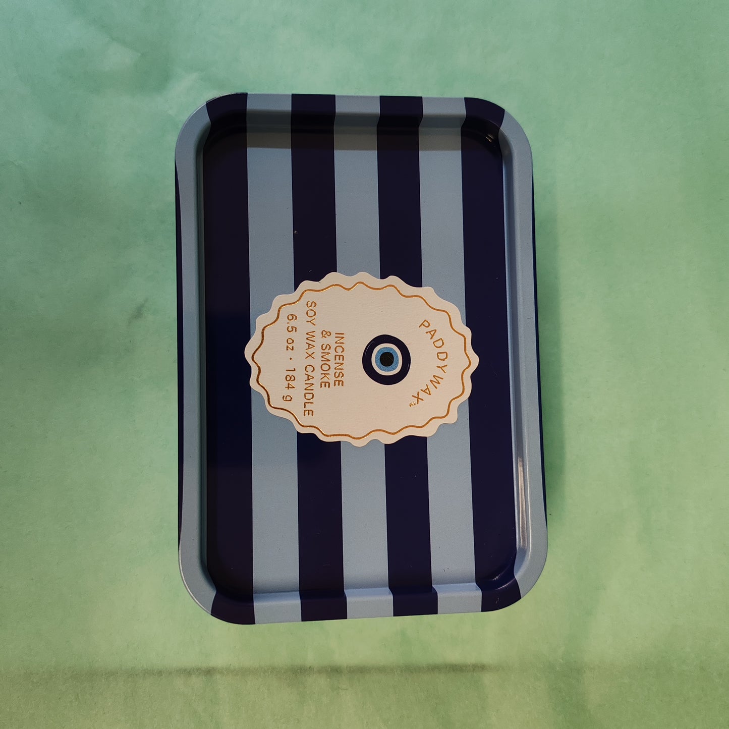 A Dopo 6oz/184g Eye Printed Tin Candle - Incense & Smoke