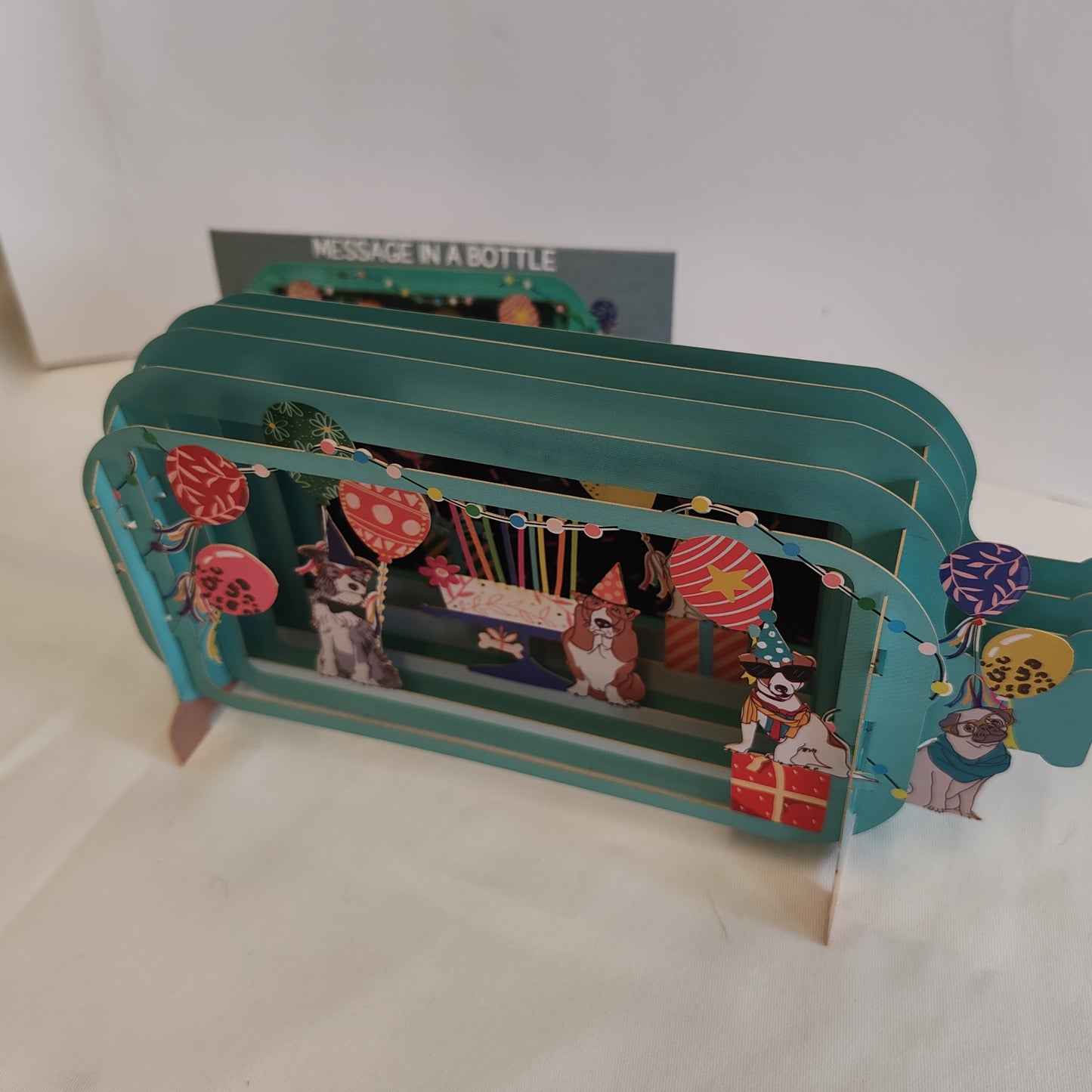 Message in a bottle greeting card dogs and cake