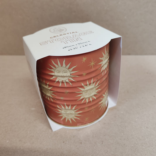 Celestial storage tin decorated with the sun faces.