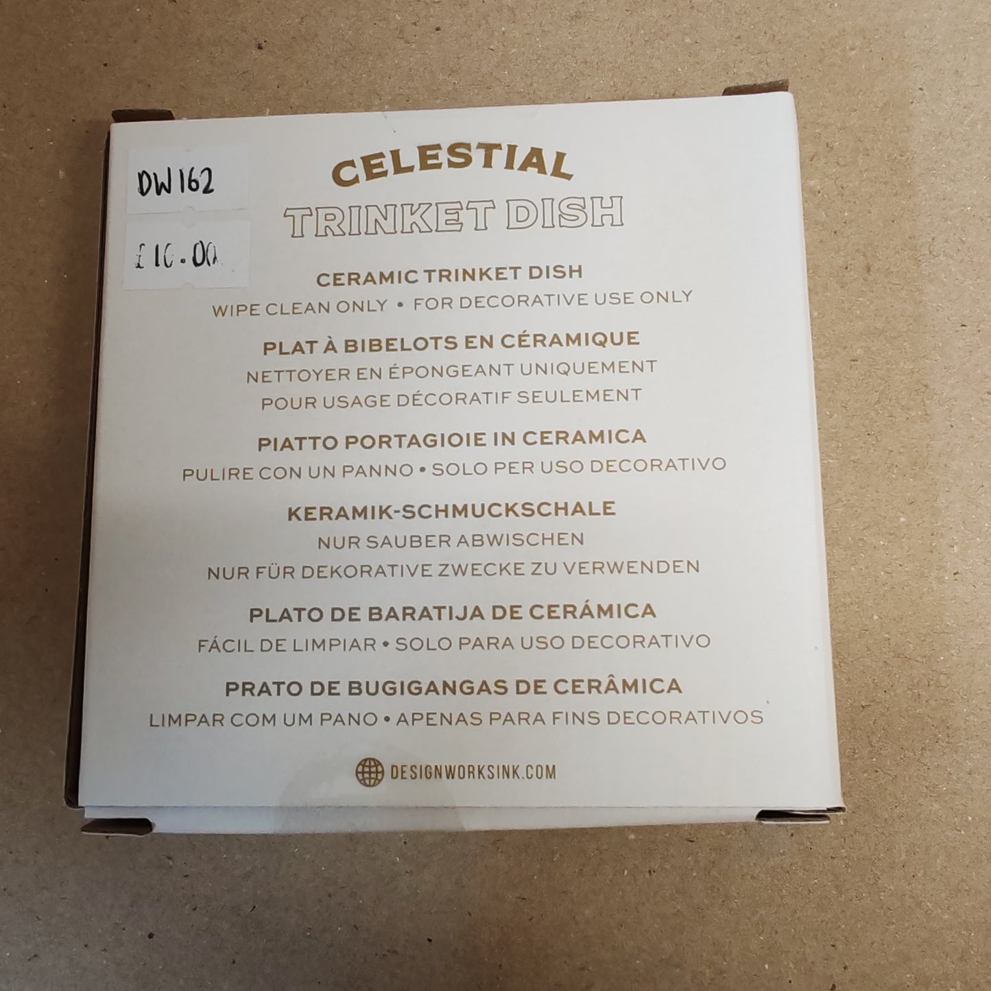 Celestial Trinket dish decorated with teal moon .