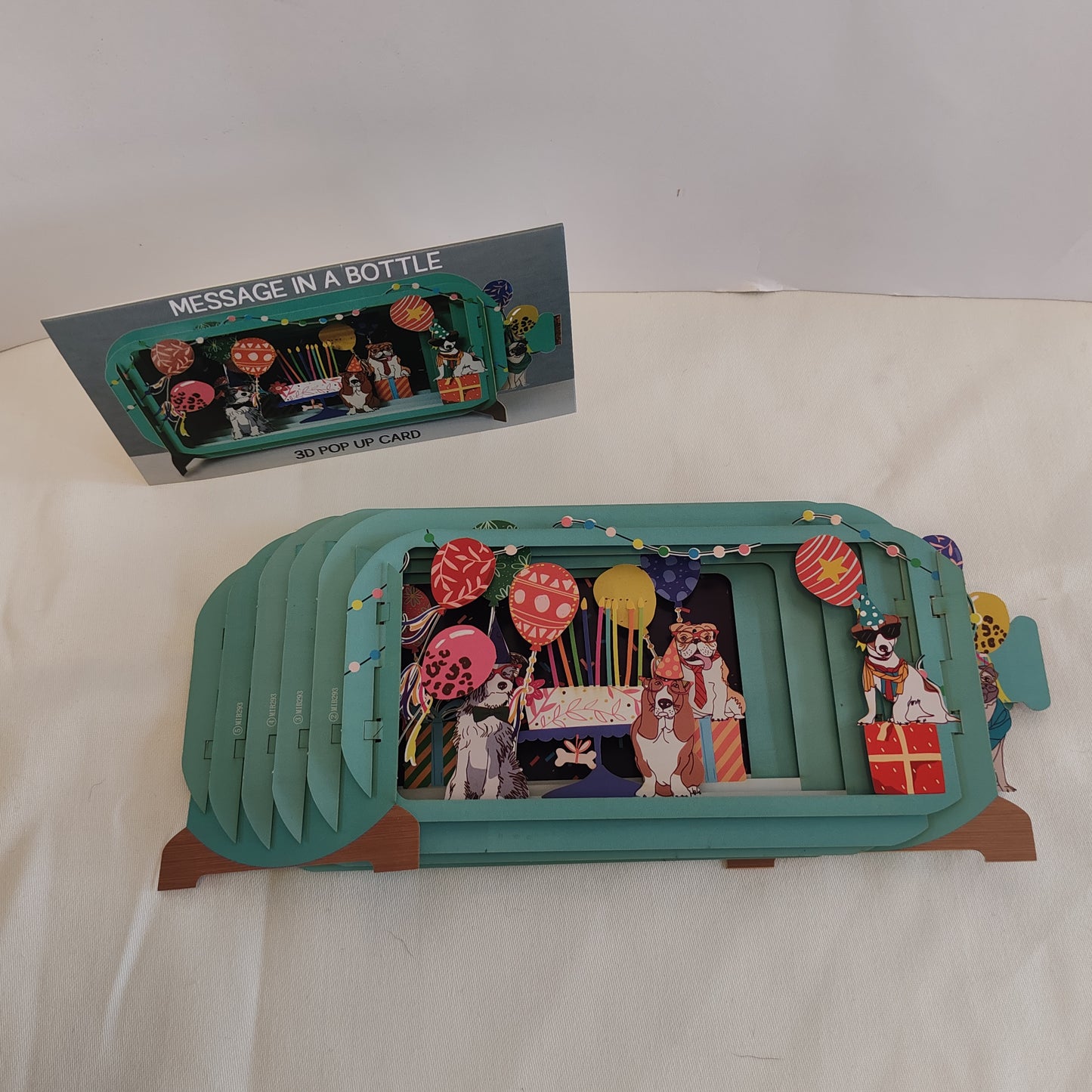 Message in a bottle greeting card dogs and cake