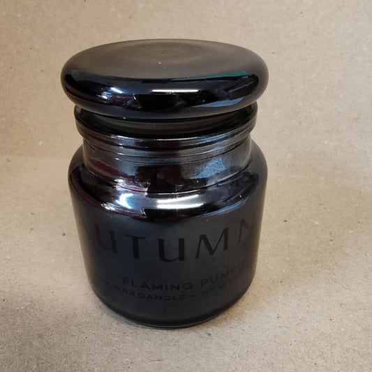 Scented candle in glass votive. Flamin Pumpkin