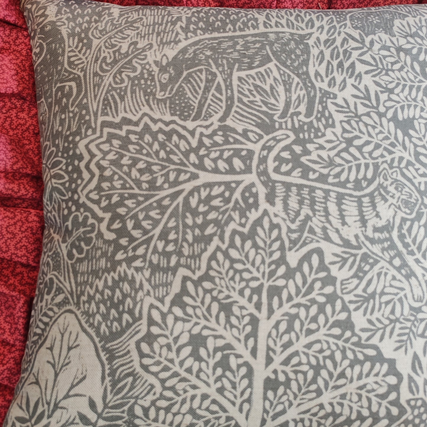Adam and Eve fabric cushions.