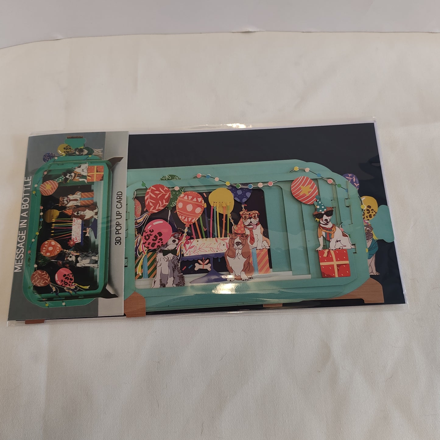 Message in a bottle greeting card dogs and cake