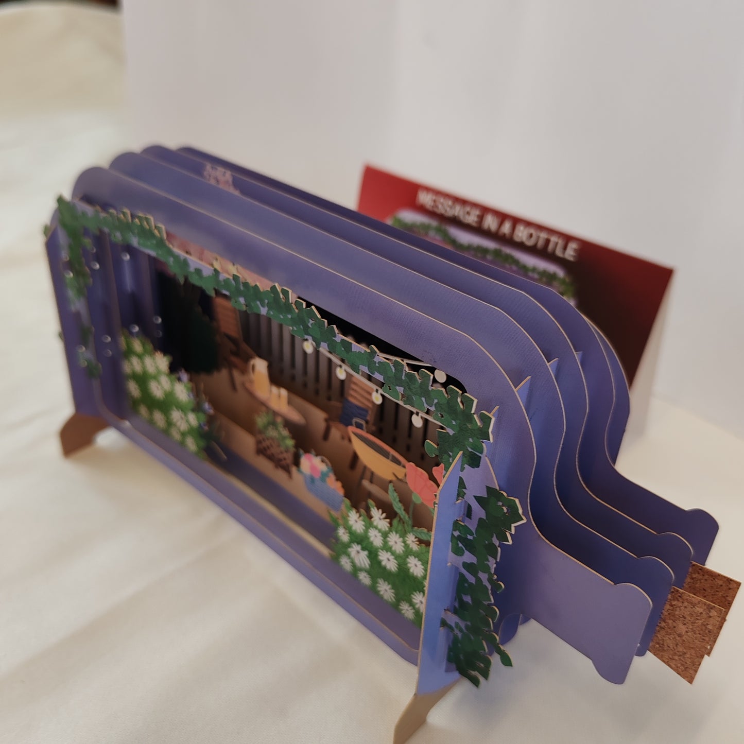 Message in a bottle pop up greeting card garden scene