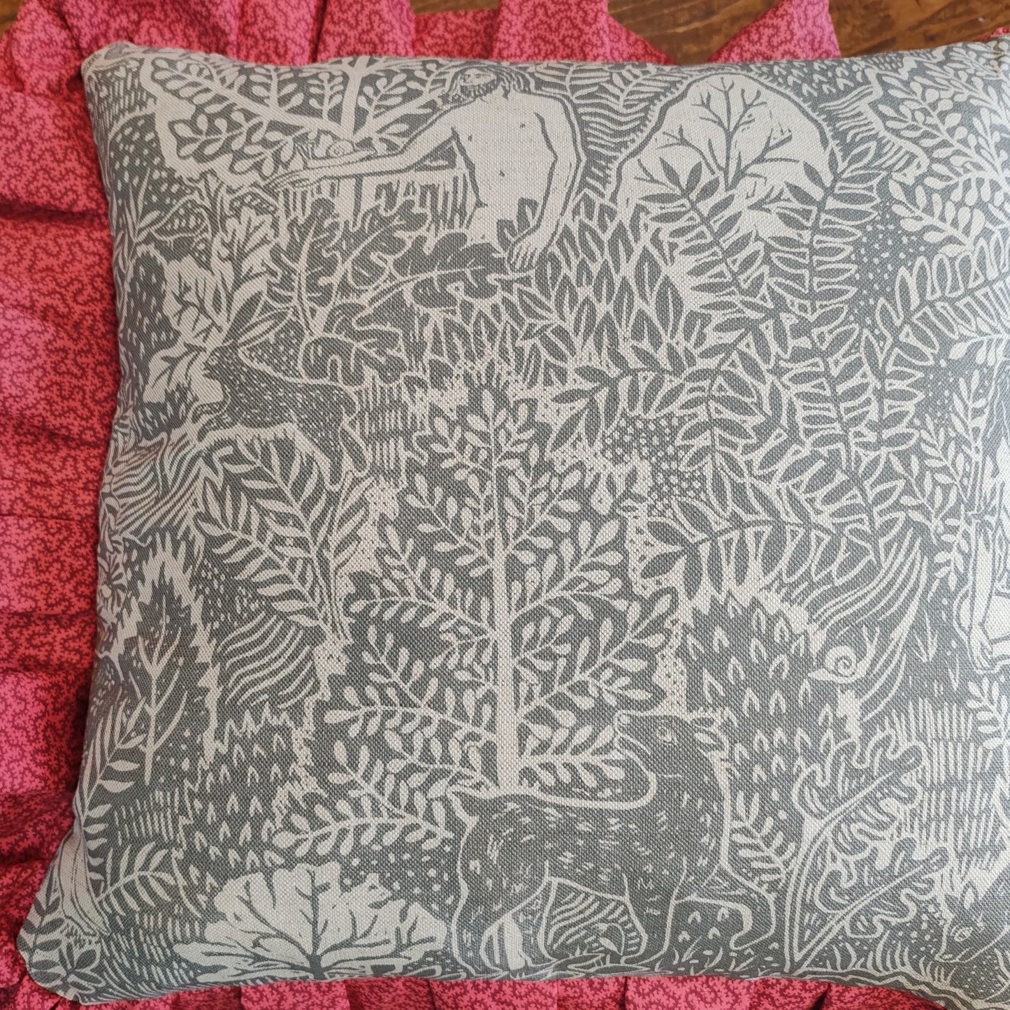 Adam and Eve fabric cushions.