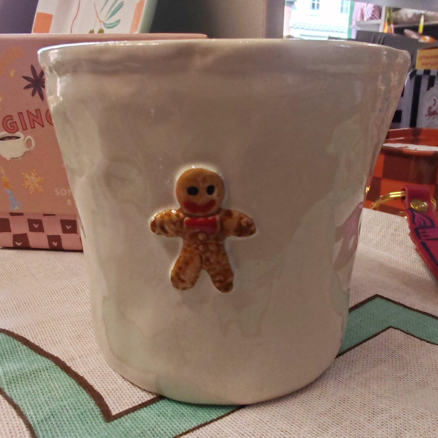Bistro 8oz ceramic scented candle. Gingerbread man.