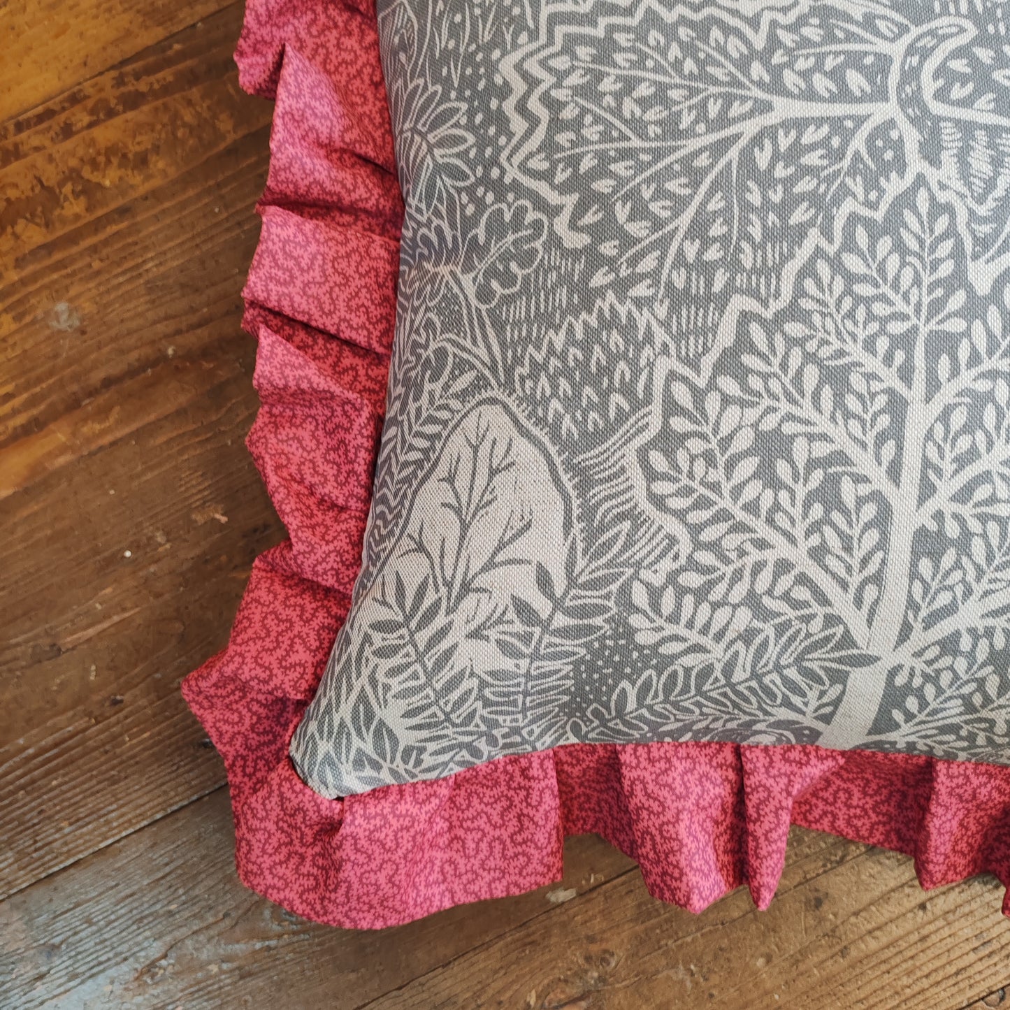 Adam and Eve fabric cushions.