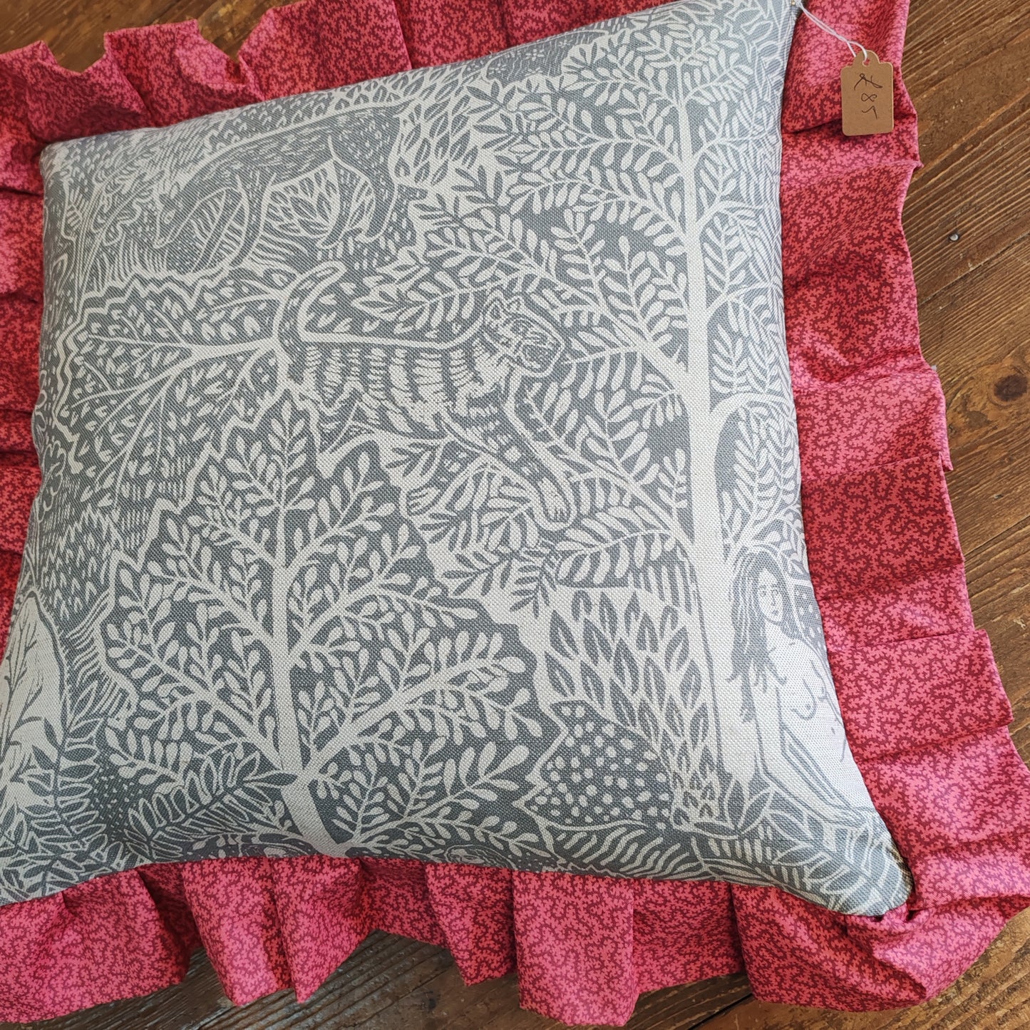 Adam and Eve fabric cushions.