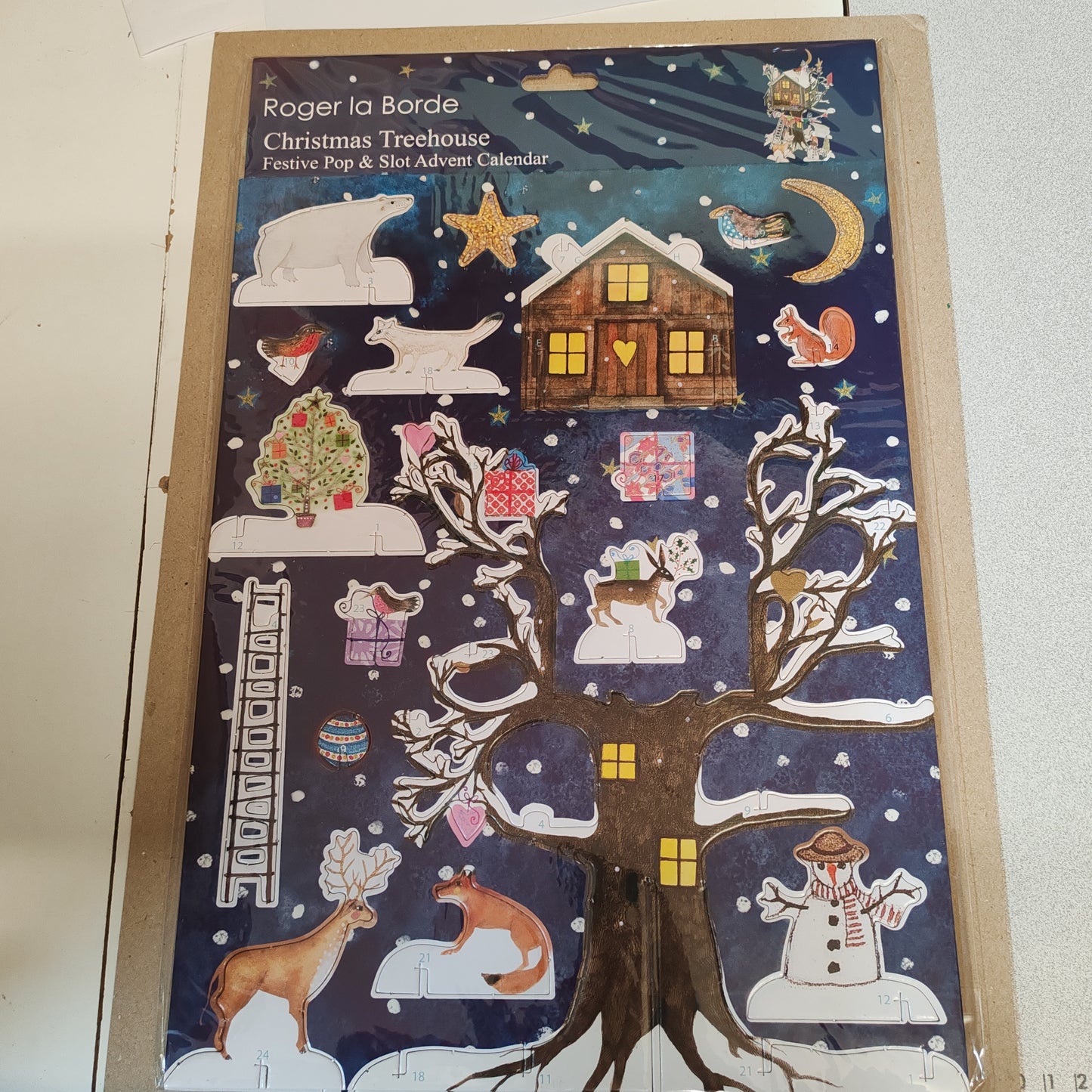 Pop, slot and build Christmas tree house advent calendar.