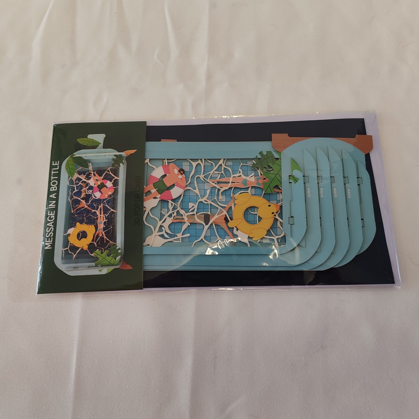 Message in a bottle swimming greeting card