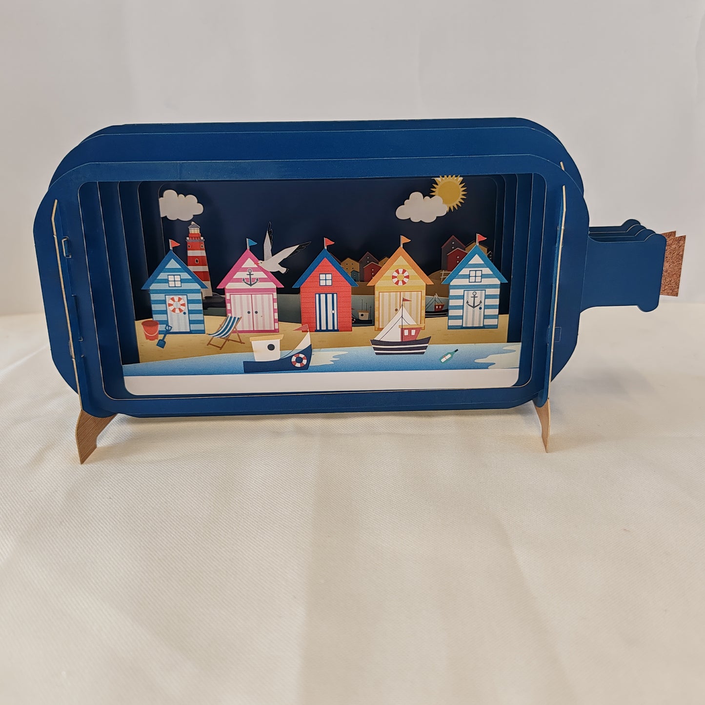 Message in a bottle pop up greeting card with beach hut scene