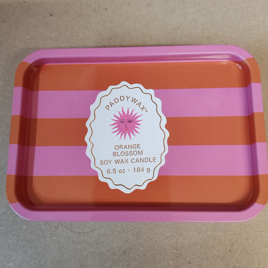 Scented candle in a stripey decorative tin. Scent of orange blossom