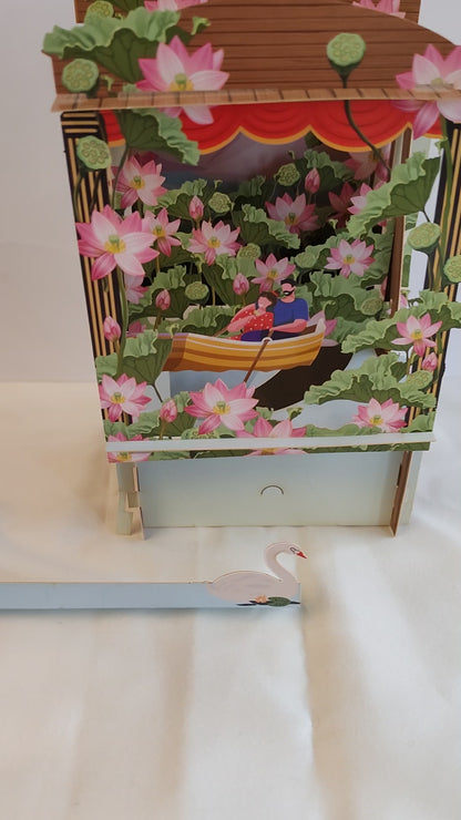 Paper theatre pop up greeting card. Romantic rowing theme