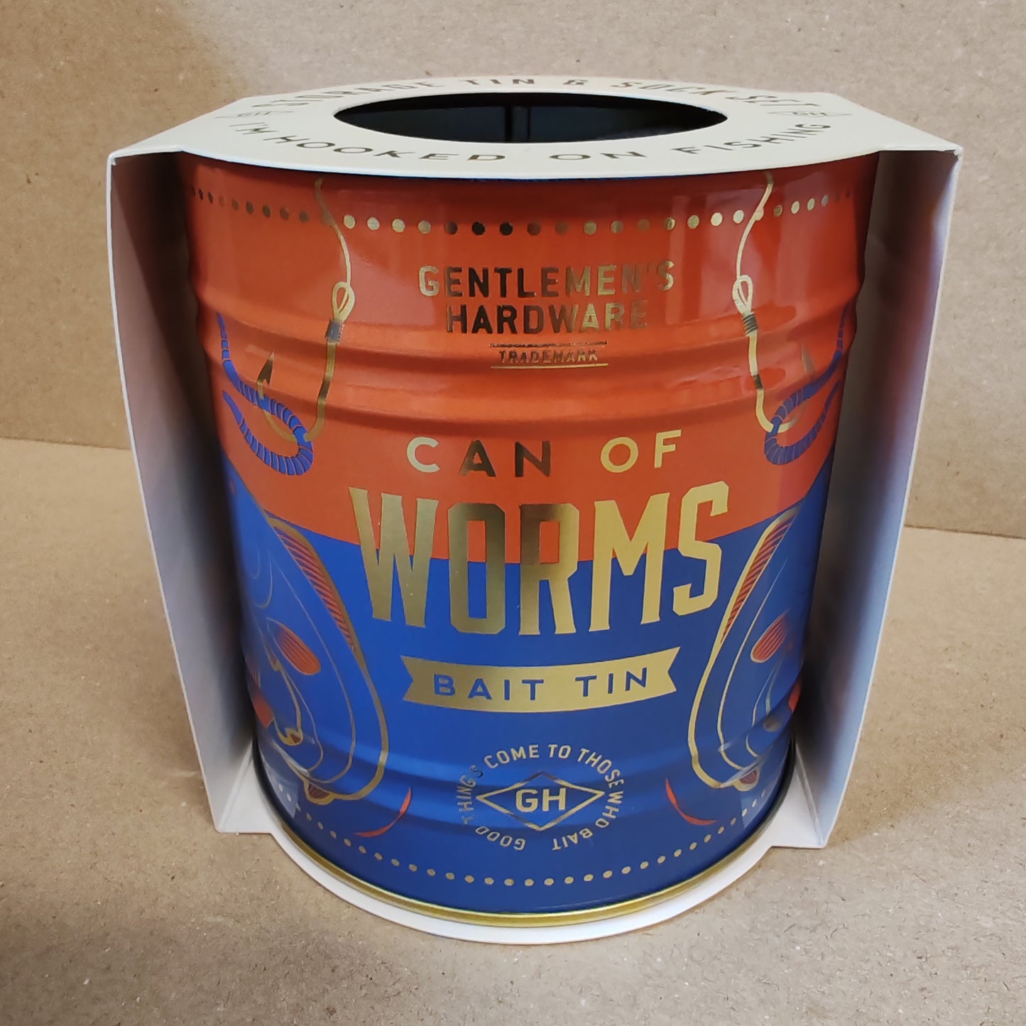 Fishing theme socks in a usable tin container.