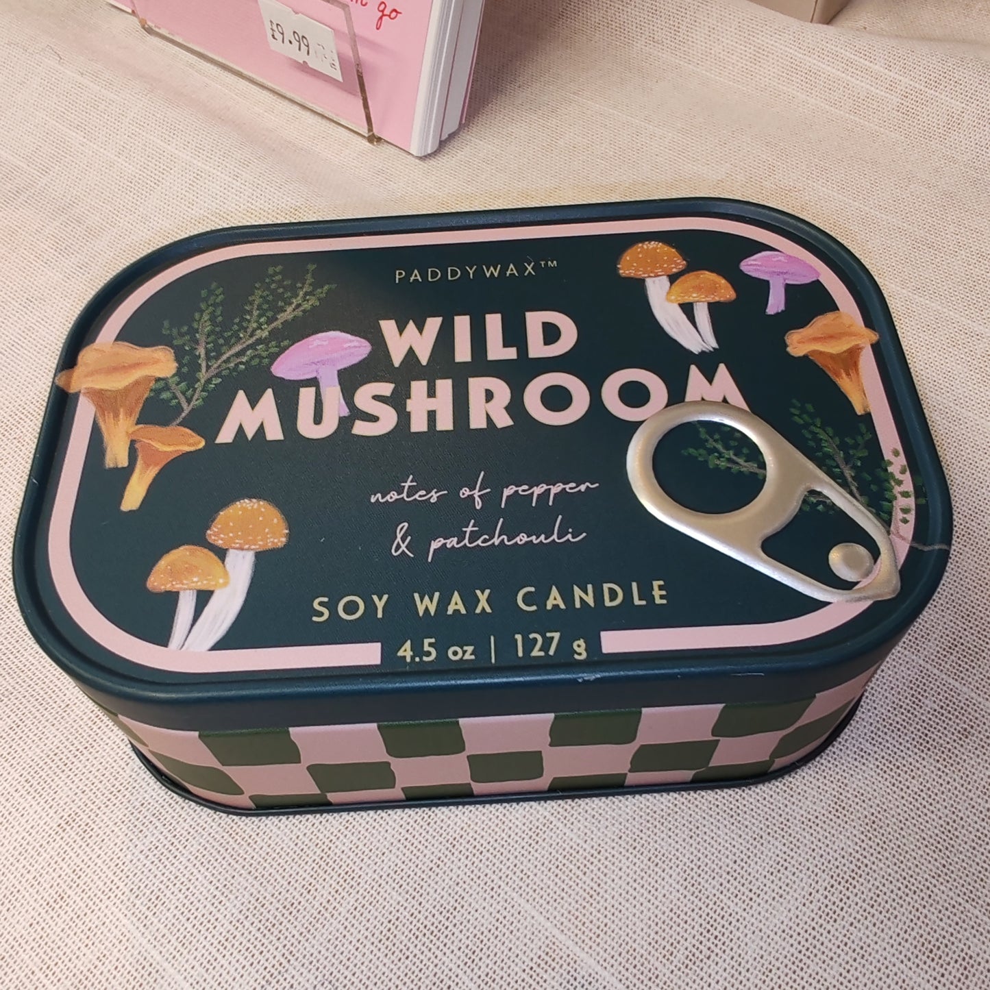 Wild mushroom printed tin candle. Scent of pepper and Patchouli.