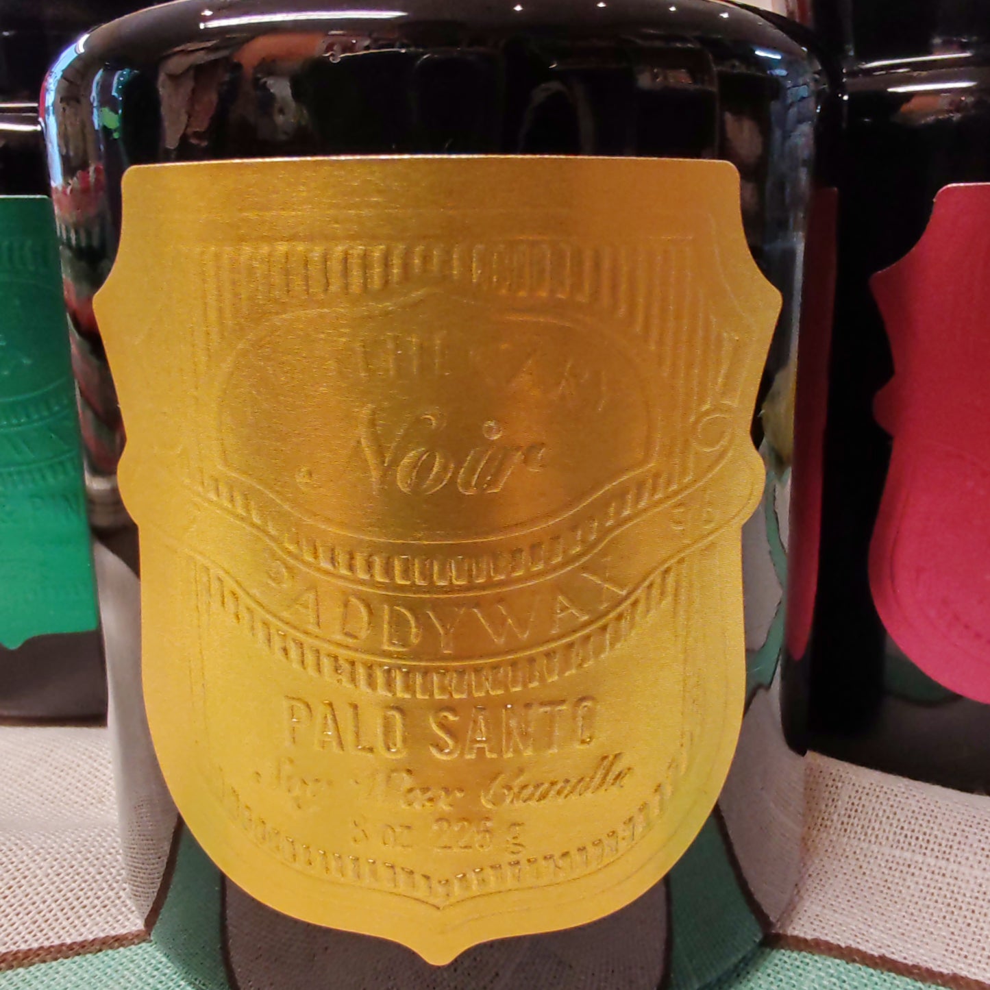 Black Apothecary Jar gold label. Scent of Palo Santo