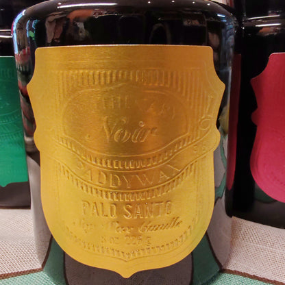 Black Apothecary Jar gold label. Scent of Palo Santo