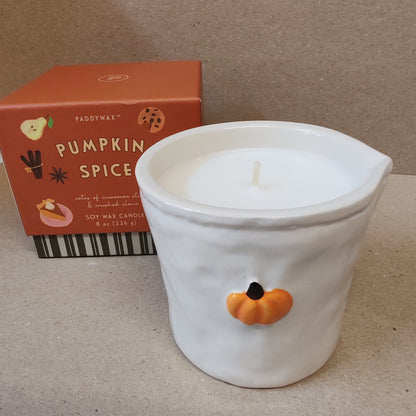 Bistro 8oz pumpkin scented candle in a ceramic pot.