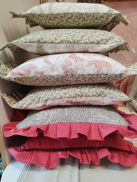 Adam and Eve fabric cushions.