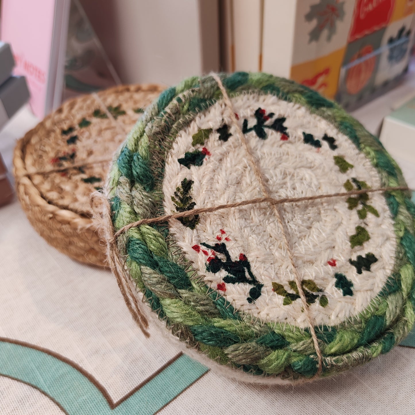 Christmas jute coasters -set of 6 in basket. 12cm