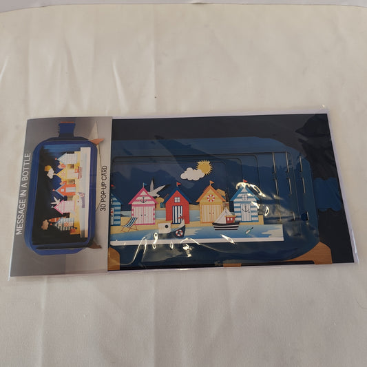 Message in a bottle pop up greeting card with beach hut scene