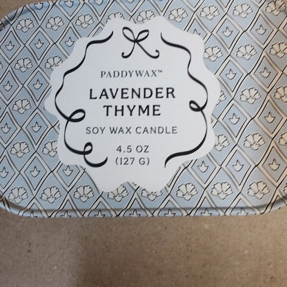 Scented 4.5oz scented candle in printed blue and white tin. Scent of lavender and thyme.