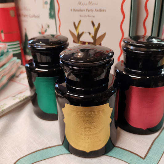 Black Apothecary Jar gold label. Scent of Palo Santo