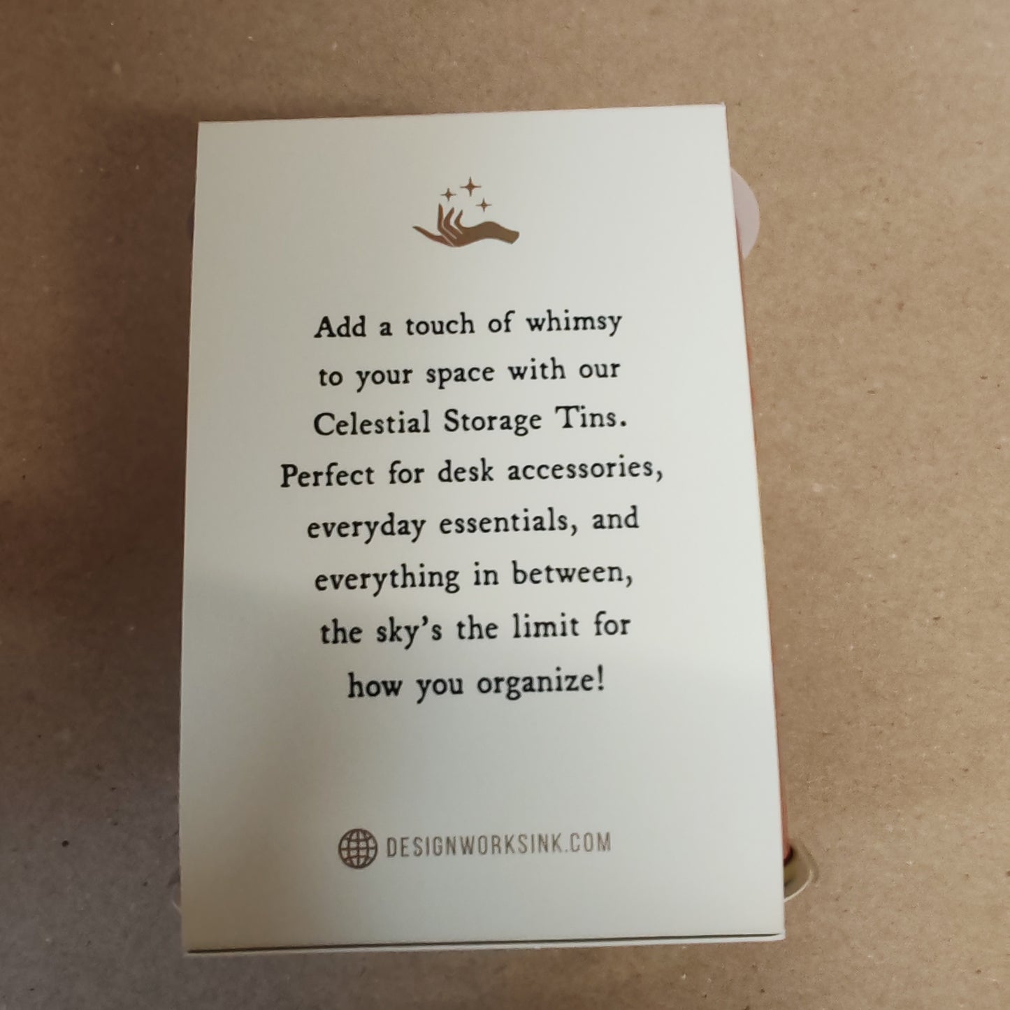 Celestial storage tin decorated with the sun faces.