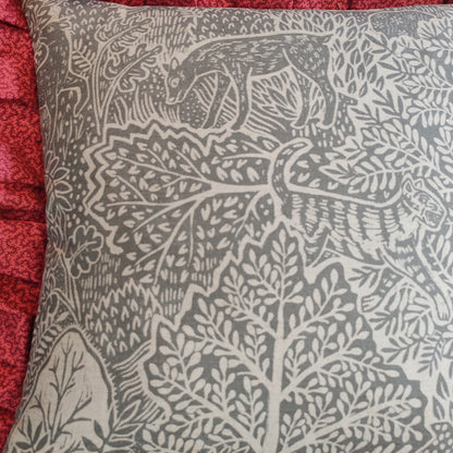 Adam and Eve fabric cushions.
