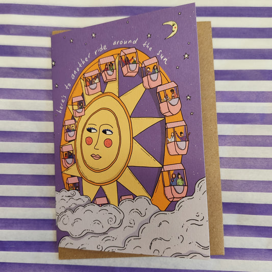 Here's to another ride around the sun greeting card