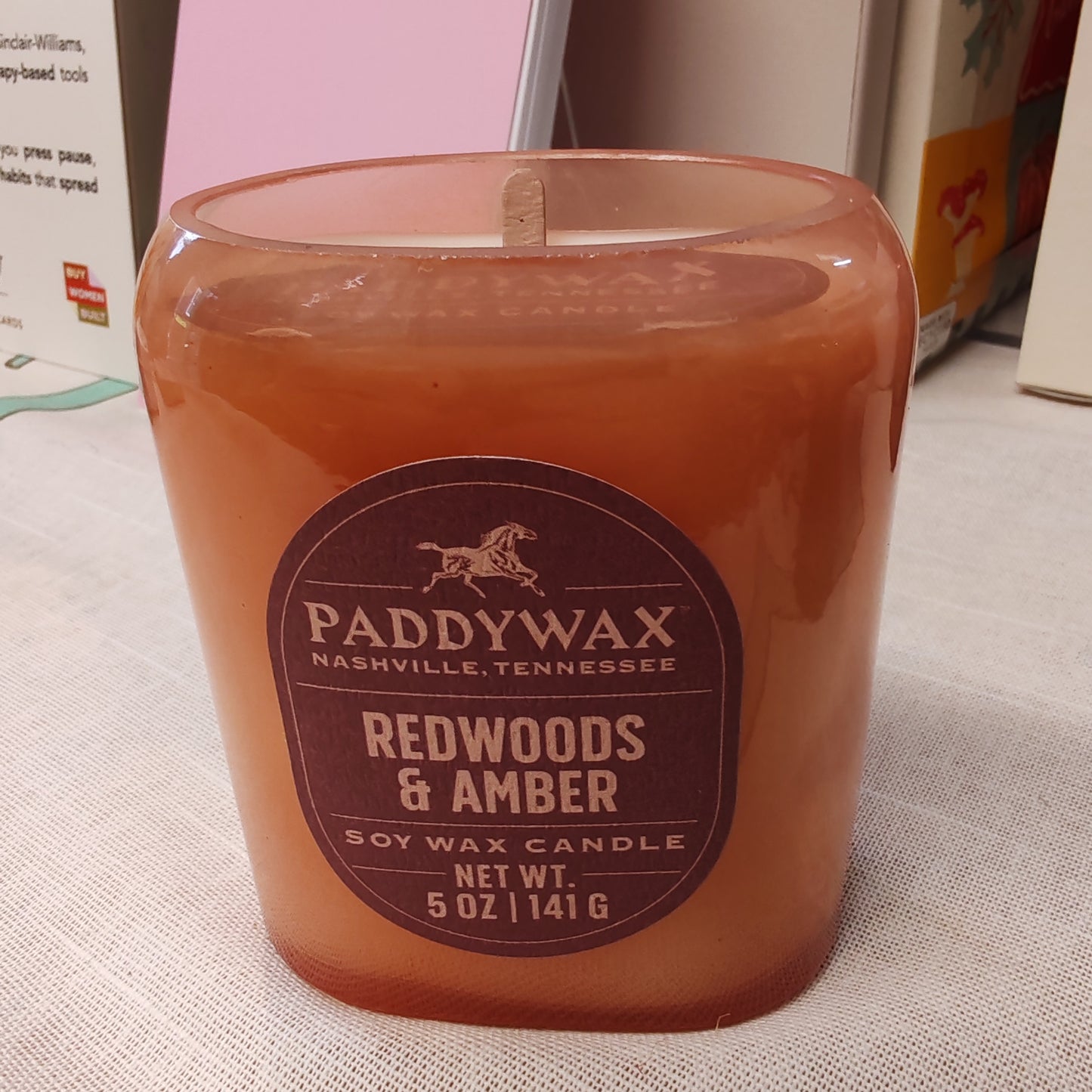 Vista Candle Redwood and Amber. Reusable glass votive