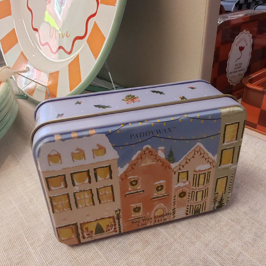 5oz printed tin scene of Christmas village. Scent of Gingerbread