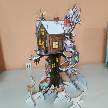 Pop, slot and build Christmas tree house advent calendar.