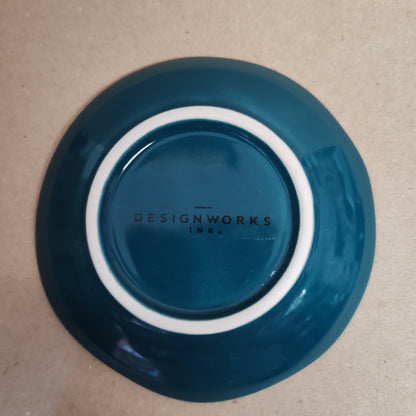 Celestial Trinket dish decorated with teal moon .