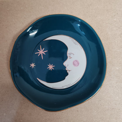 Celestial Trinket dish decorated with teal moon .