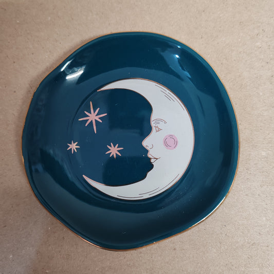 Celestial Trinket dish decorated with teal moon .