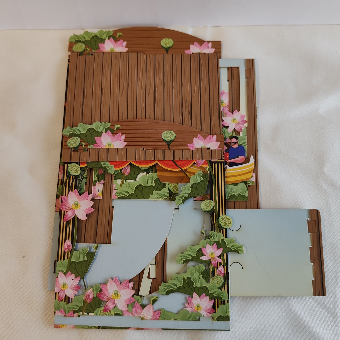 Paper theatre pop up greeting card. Romantic rowing theme