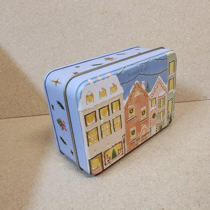 5oz printed tin scene of Christmas village. Scent of Gingerbread