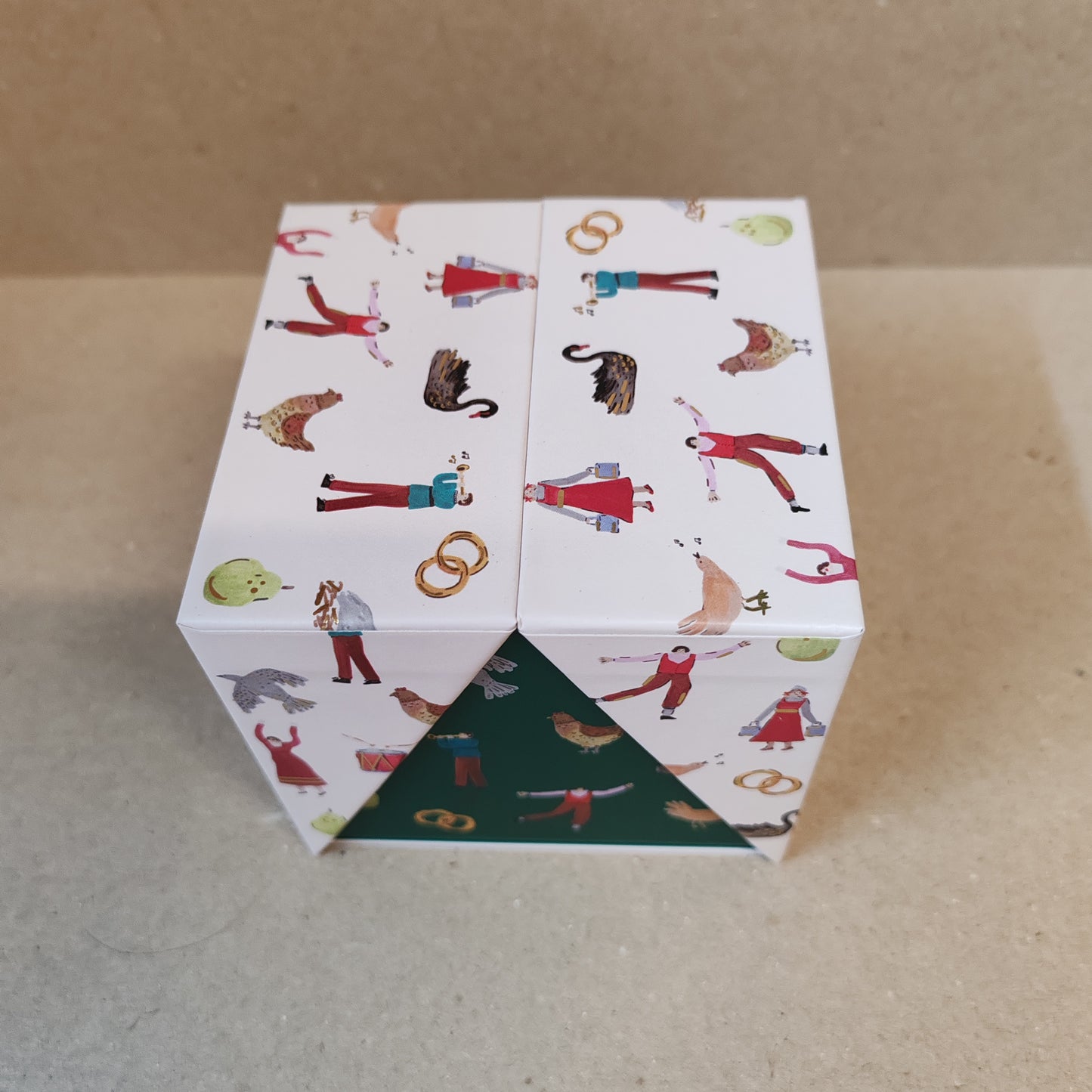 Festive fir and balsalm scented candle in a green glass votive. Exquisite packaging