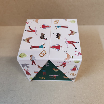 Festive fir and balsalm scented candle in a green glass votive. Exquisite packaging