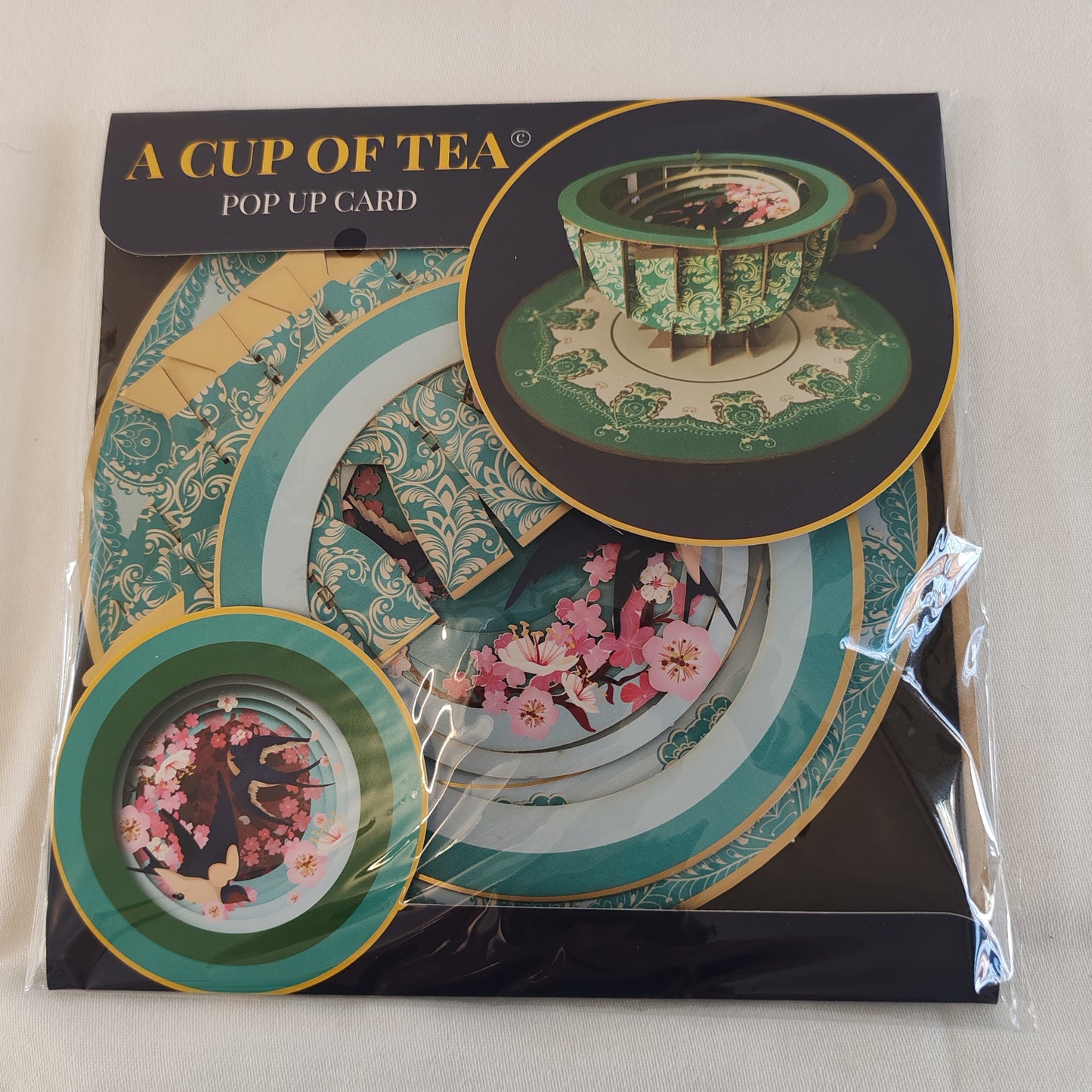 Cup of tea pop up greeting card. Cherry blossom theme.