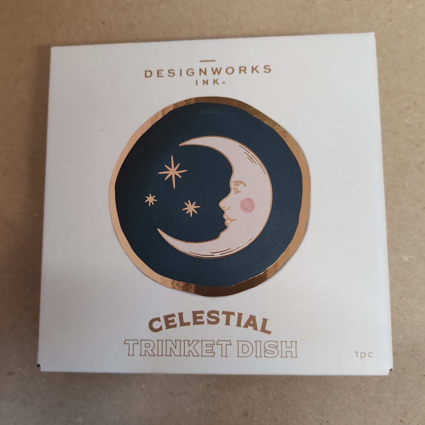 Celestial Trinket dish decorated with teal moon .