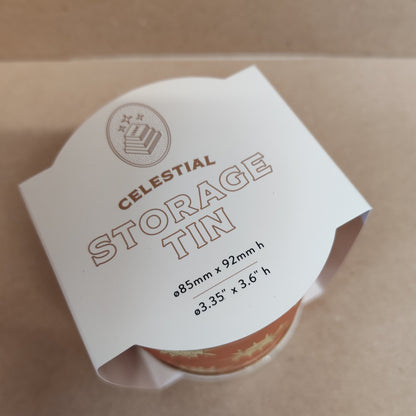 Celestial storage tin decorated with the sun faces.