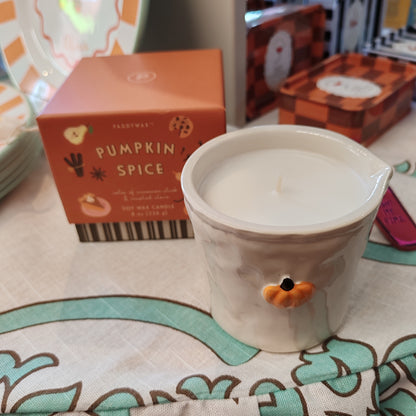 Bistro 8oz pumpkin scented candle in a ceramic pot.